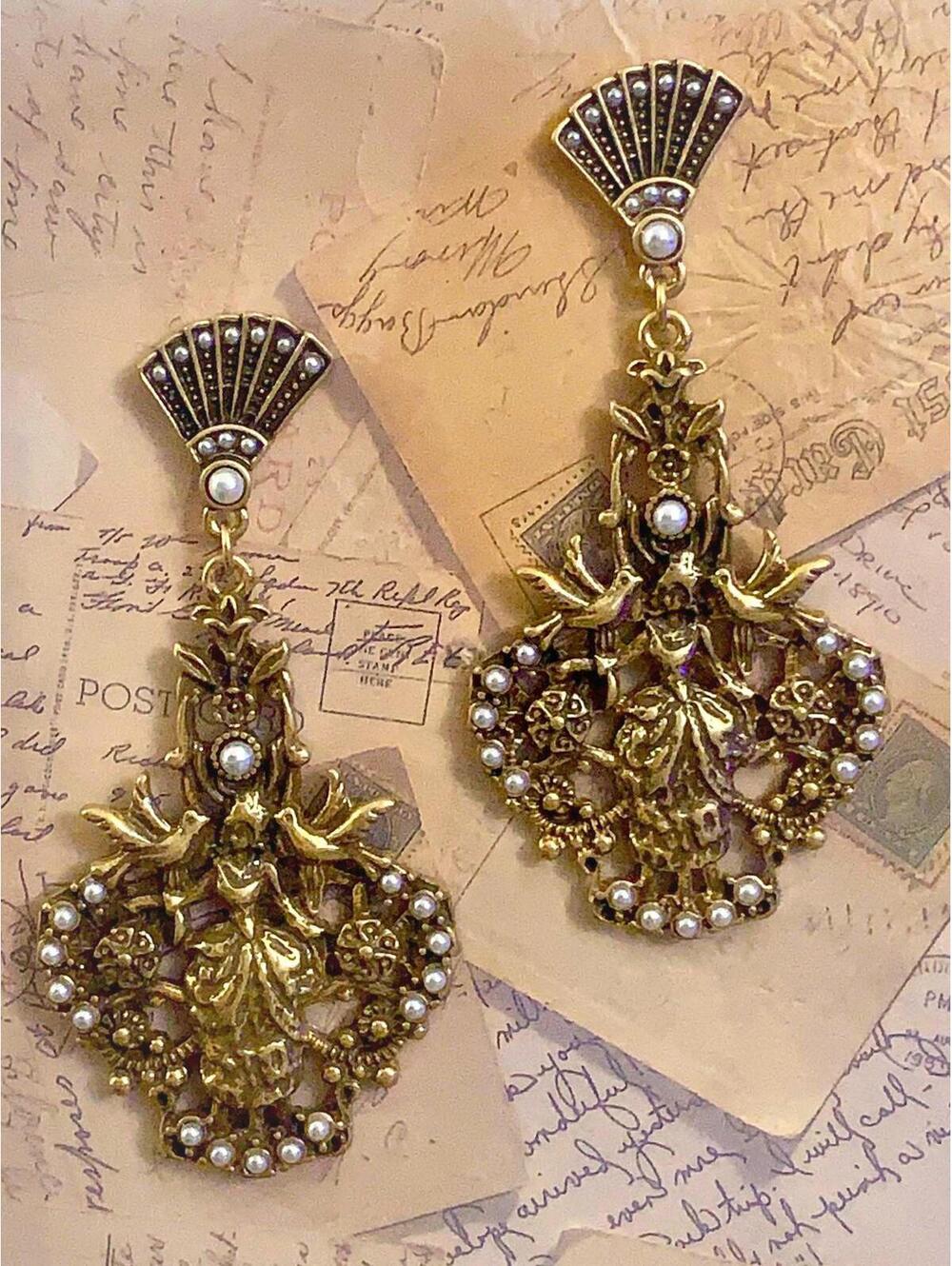 Golden Ornate Pearl Accent Dangle Earrings with Bird Motif